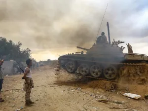 Fighters loyal to the Libyan internationally-recognised Government of National Accord (GNA) are pictured near the frontline during clashes against forces loyal to strongman Khalifa Haftar, on June 1, 2019, in al-Sawani area, south of the Libyan capital Tripoli. (Mahmud TURKIA / AFP)