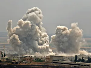 Plumes of smoke rise following reported Syrian government forces' bombardment on the town of Khan Sheikhun in the southern countryside of the jihadist-held Idlib province, on June 7, 2019. (AFP/ File Photo)