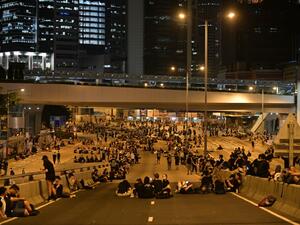 Protesters rest on a road as they rally against a controversial extradition bill in Hong Kong early on June 17, 2019. (AFP/ File Photo)