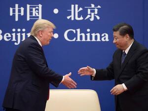 Chinese leader Xi Jinping shakes hands with U.S. President Donald Trump during a business leaders event. (AFP/ File Photo)