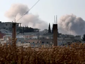 Smoke billows in the village of Hamameya in Syria's Idlib province on July 11, 2019 during clashes between jihadists and fighters from Syria's former Al-Qaeda affiliate Hayat Tahrir al-Sham (HTS). (AFP/ File Photo)