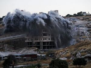 This picture taken on July 22, 2019, shows the demolition of a Palestinian building which was under construction, in the the Palestinian village of Sur Baher in East Jerusalem. (AFP/ File Photo)