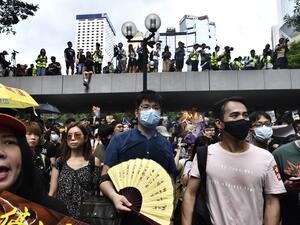 Protesters march during a demonstration in Hong Kong (AFP)