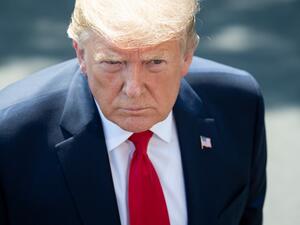 US President Donald Trump speaks to the media after arriving on the South Lawn of the White House in Washington, DC, July 30, 2019, following a trip to the 400th anniversary of Jamestown., Virginia. (SAUL LOEB / AFP)