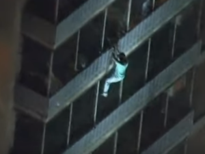 A Philadelphia man's love for his bedridden mother made headlines when he scaled a burning 19-storey building to save her. (YouTube Screenshot)