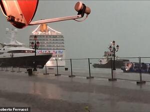 An Italian cruise ship had just seconds to swerve dry land in a Venice dock after its captain appeared to lose control of the vessel during a heavy storm. (YouTube)