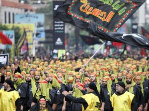 Supporters of Lebanon's Hezbollah movement take part in a parade. (AFP/ File Photo)