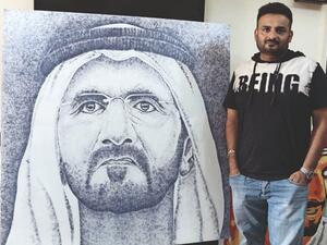 Indian artist makes Sheikh Mohamed's portrait with Expo logos. (Twitter)