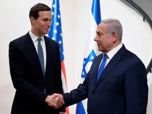 US presidential adviser Jared Kushner shakes hands with Israeli Prime Minister Benjamin Netanyahu in Jerusalem on 30 May (AFP)