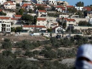 A Palestinian protestor in front of the Israeli settlement of Qadumim (Kedumim), near Nablus, in the occupied West Bank. (AFP/ File Photo)