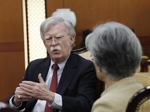 US National Security Advisor John Bolton (L) (AFP)