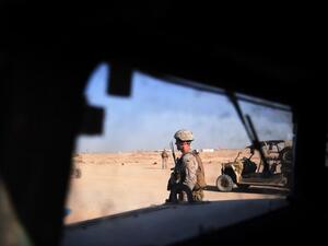 US Marines keep watch as unseen Afghan National Army soldiers  (AFP)