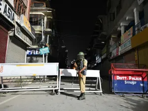 An Indian paramilitary trooper stands guard  (AFP)
