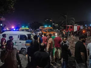 Onlookers gather during the night of August 5, 2019, at the scene of an accident that took place just before midnight (AFP)