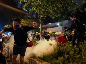 Police in Hong Kong fired volleys of tear gas on August 11 at thousands of pro-democracy protesters who defied warnings from authorities to hit the streets for the tenth weekend in a row. (Manan VATSYAYANA / AFP)