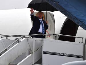 US President Donald Trump boards Air Force One at Pittsburgh International Airport in Pennsylvania on August 13, 2019, before returning to his Bedminster golf club in New Jersey where he is spending his summer vacation. (Nicholas Kamm / AFP)