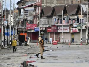 A security personnel patrols on a deserted road of the Lal Chowk area in Srinagar on August 19, 2019. (AFP/ File Photo)