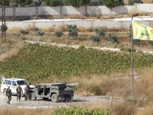Lebanese army and United Nations Interim Forces in Lebanon (UNIFIL) vehicles patrolling in the Lebanese village of Aitaroun along the the Israeli side of the border with Lebanon i Lebanese border. (AFP/ File Photo)