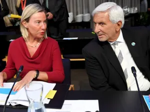 High Representative of the European Union for Foreign Affairs and Security Policy and Vice-President of the European Commission Federica Mogherini (L) and General Director of EU Council Leonardo Schiavo  (AFP)