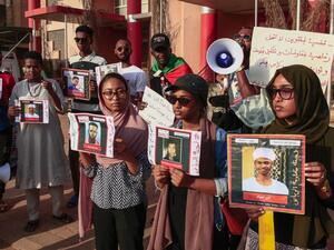 Sudanese protesters hold posters bearing the portraits of missing people during a rally in the capital Khartoum on august 30, 2019, marking the International Day of the Disappeared. Hundreds of Sudanese took to the streets to demand answers on the whereabouts of demonstrators missing since the deadly dispersal of a protest camp in June.  Ebrahim HAMID / AFP