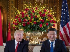 US President Donald Trump with Chinese President Xi Jinping during a bilateral meeting in Florida. (AFP/ File)