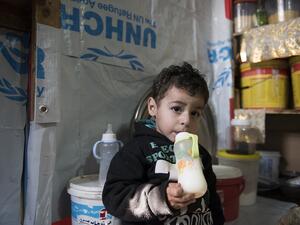 Lebanon. Syrian refugee family receiving cash assistance