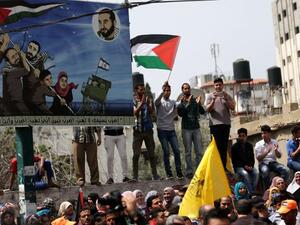 A struggle for freedom. Palestinians take part in a demonstration in support of Palestinian prisoners held in Israeli jails, on April 17. (AFP)