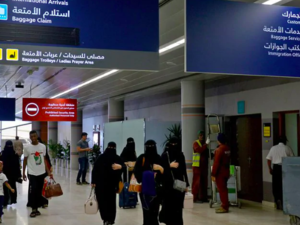 Saudi women at Abha airport in Saudi Arabia on June 13. Changes announced Friday will allow women to travel without permission from a male relative. (Fayez Nureldine/AFP/Getty Images)