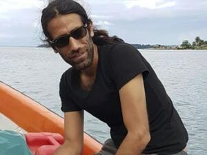 When Kurdish-Iranian journalist Behrouz Boochani won Australia's most valuable literary prize this week, he could not attend the ceremony to accept it. (AFP/ File Photo)