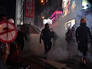 Protesters walk through a cloud of teargas as they occupy Hennessy Road in Hong Kong on August 31, 2019. (AFP/ File Photo)