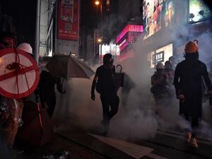Protesters walk through a cloud of teargas as they occupy Hennessy Road in Hong Kong on August 31, 2019. (AFP/ File Photo)