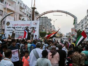 People fly the flags of the UAE (R) and south Yemen (L) as Yemenis from the country's south gather ahead of a demonstration in support of the UAE called for by the Southern Transitional Council (STC) which seeks independence for south Yemen, at al-Maala square in the centre of the second city of Aden on September 4, 2019. (AFP/ File Photo)