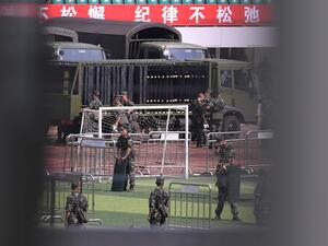 Chinese military personnel train at Shenzhen Bay stadium in Shenzhen in China's southern Guangdong province (AFP)