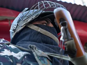 An Indian paramilitary trooper stands guard during heavy restrictions on movements in Srinagar  (AFP)