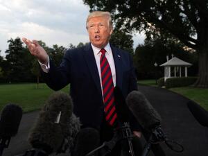 US President Donald Trump gestures as he speaks to the media prior to departing on Marine One from the South Lawn of the White House in Washington, DC, September 12, 2019. (AFP/ File Photo)
