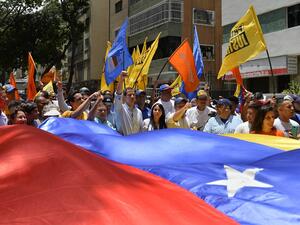 Venezuelan opposition leader and self-proclaimed acting president Juan Guaido (C) gestures during a rally in Baruta neighbourhood, in Caracas on September 14, 2019. (Matias Delacroix / AFP)