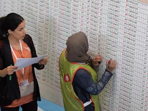 Staff members of Tunisia's Independent Higher Authority for Elections (ISIE) tally votes as they prepare the results of the presidential vote at a sorting center in Ariana, north of the capital Tunis on September 16, 2019. (AFP/ File Photo)