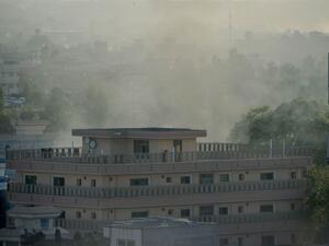 Smoke rises from a government building which is targeted by gunmen in Jalalabad on September 18, 2019.  (AFP/ File Photo)