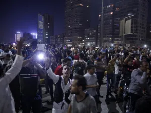 Egyptian protesters shout slogans as they take part in a protest calling for the removal of President Abdel Fattah al-Sisi in Cairo's downtown on September 20, 2019. (AFP)