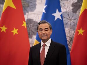 China's Foreign Minister Wang Yi looks on during the signing of a joint communique establishing diplomatic relations between China and the Solomon Islands, at the Diaoyutai State Guesthouse in Beijing on September 21, 2019. (NOEL CELIS / AFP)