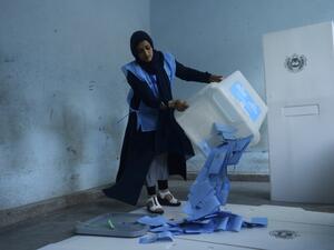 An Afghan Independent Election Commission (IEC) official empties a ballot box to count ballot papers after polling stations closed, in Herat on September 28, 2019. (AFP/ File Photo)