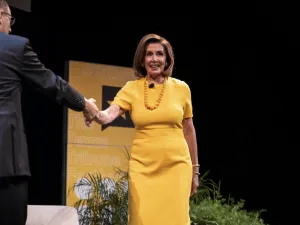 Speaker of the House of Representatives, Nancy Pelosi is greeted on stage by Texas Tribune CEO, Smith at The Texas Tribune Festival on September 28, 2019 in Austin, Texas. (AFP/ File Photo)