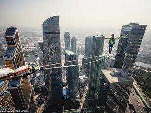 Pictured: a female athlete takes part in the record breaking feat. (Daily Mail)