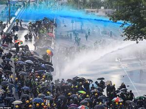 Police fired water cannons Pro-democracy protesters outside the government headquarters in Hong Kong. (AFP/ File Photo)