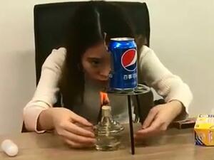 Ms Yeah, a blogger from China, released a video of her making popcorn with a tin can and an alcohol lamp in 2017. The woman has faced controversy after a girl died copying the video. (YouTube)
