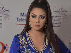 Ibtissam Tiskat changed the color of her brunette tresses into purple Source @ibtissamtiskatofficial Instagram