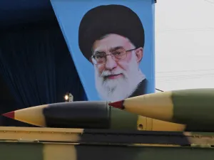 Iranian military truck carrying surface-to-air missiles past a portrait of Iran's Supreme Leader Ayatollah Ali Khamenei during a parade on the occasion of the country's annual army day. (AFP/ File Photo)