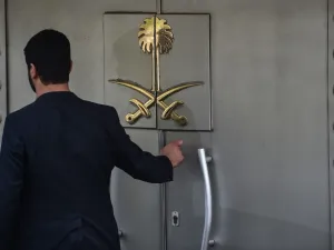 In this file photo taken on November 1, 2018, a Saudi official waits in front of the door of the Saudi Arabian consulate in the Turkish city of Istanbul. (AFP/ File Photo)