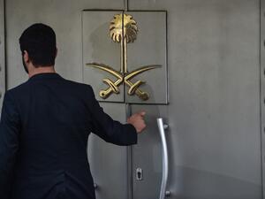 In this file photo taken on November 1, 2018, a Saudi official waits in front of the door of the Saudi Arabian consulate in the Turkish city of Istanbul. (AFP/ File Photo)