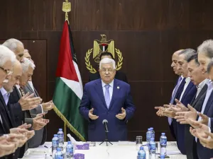 Palestinian president Mahmud Abbas (C) recites the Fatiha prayer before chairing a meeting of the central committee of the Fatah movement in the West Bank city of Ramallah on October 1, 2019. ABBAS MOMANI / AFP